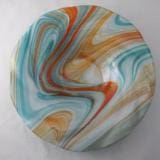 A bowl with swirling colors on it