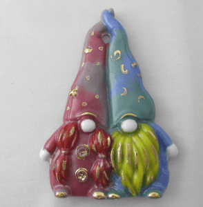 Two gnomes are standing next to each other.