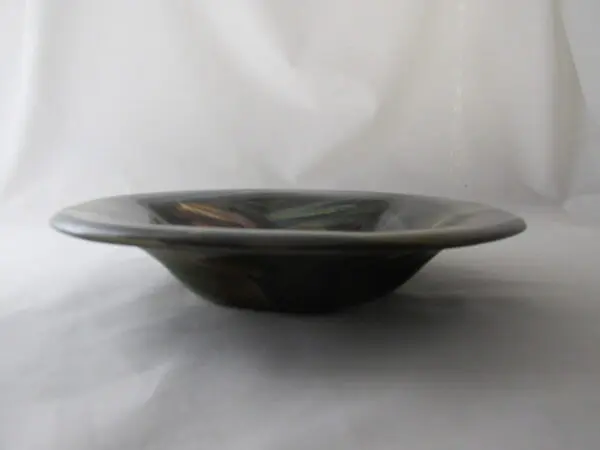 A bowl sitting on top of a table.