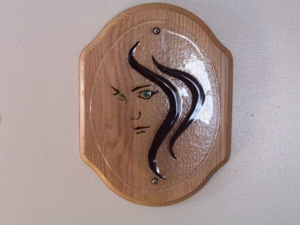 Green Eye Girl on oak plaque