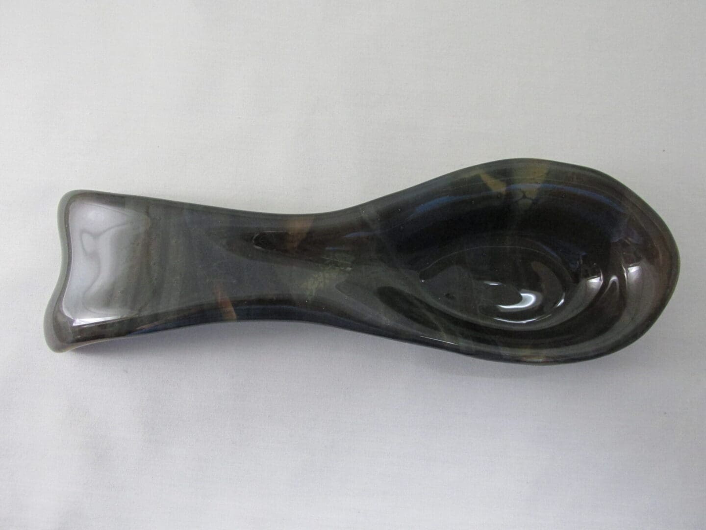 Glossy black ceramic spoon rest