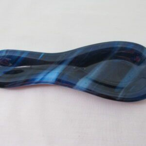 Blue glass spoon rest with swirls
