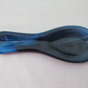 Translucent deep blue spoon rest with teardrop shape